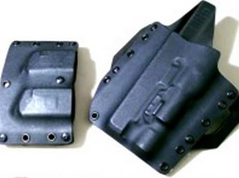 Kydex holsters molded for a pistol, including one cut for a weapon light